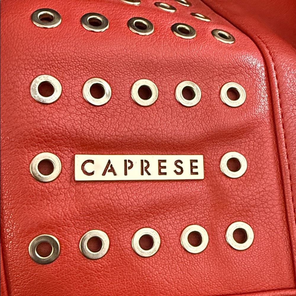 CAPRESE Stylish Red Handbag with Eyelet Design - Picture 12 of 16